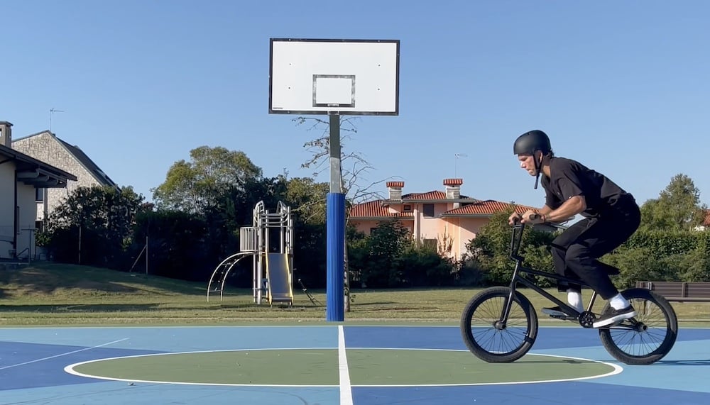 compress your body to do a bunny hop for pulling a barspin